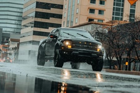 Car driving on wet road