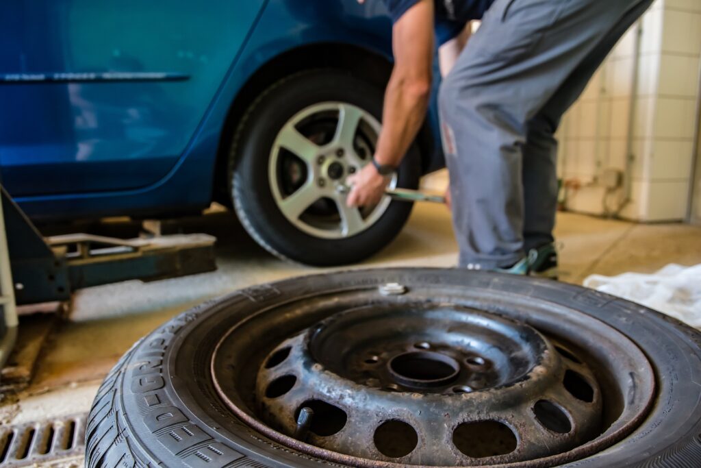 A Person changing a tyre