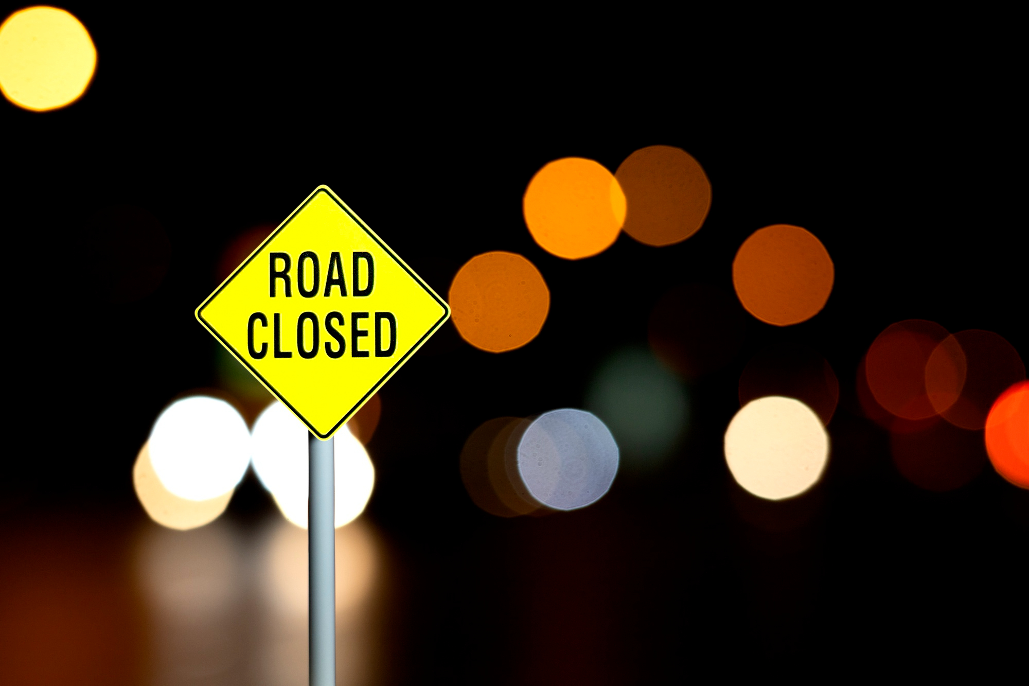Road close sign in the night light